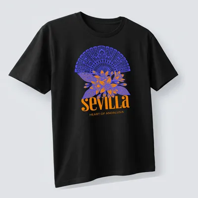 Vibrant floral fan graphic with Sevilla Heart of Andalusia text in blue and orange — printed on a unisex t-shirt (angled view)