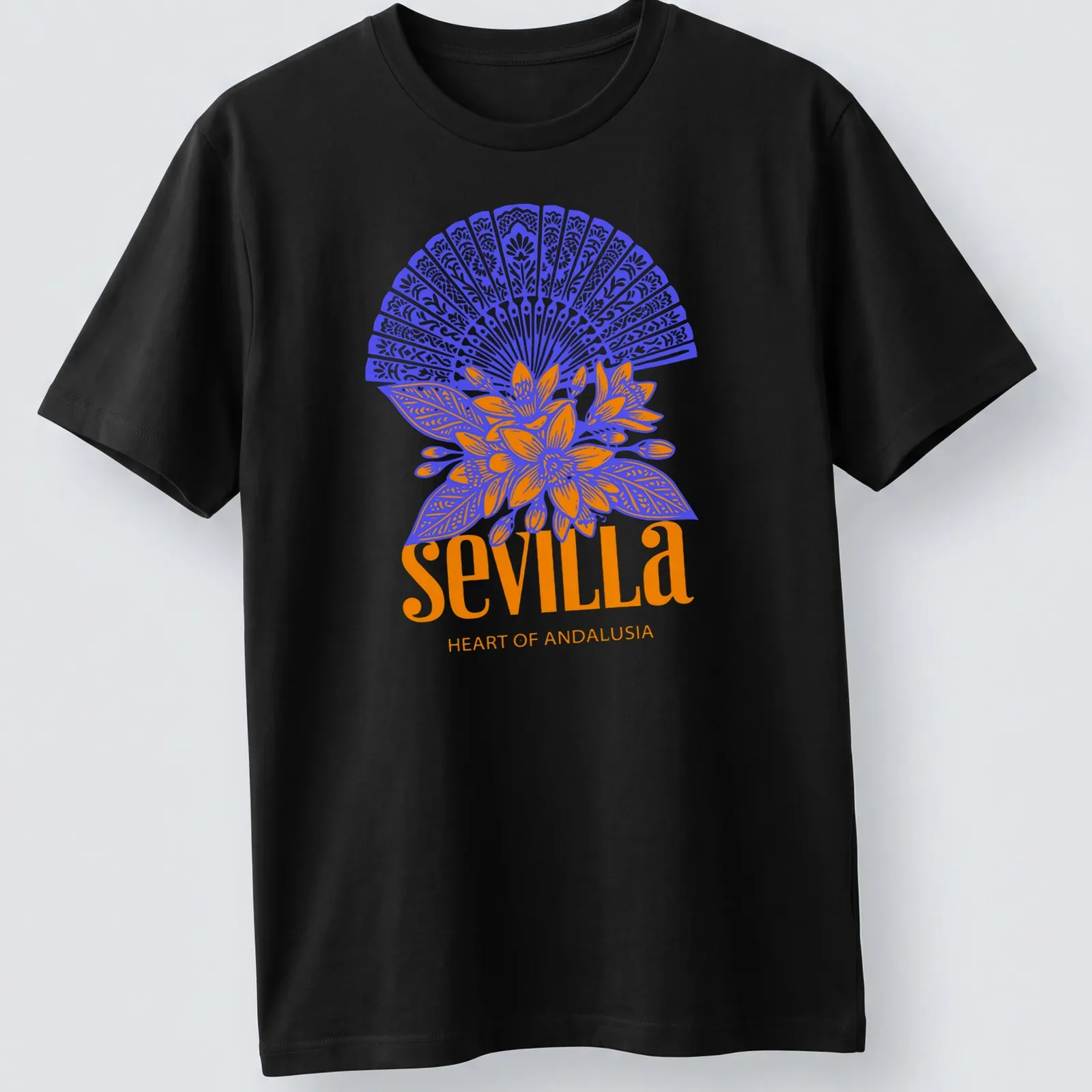 Vibrant floral fan graphic with Sevilla Heart of Andalusia text in blue and orange — printed on a unisex t-shirt