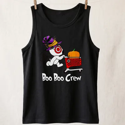 Cartoon dog in witch hat with pumpkin and shopping cart, text: Target Team Member — printed on a tank top