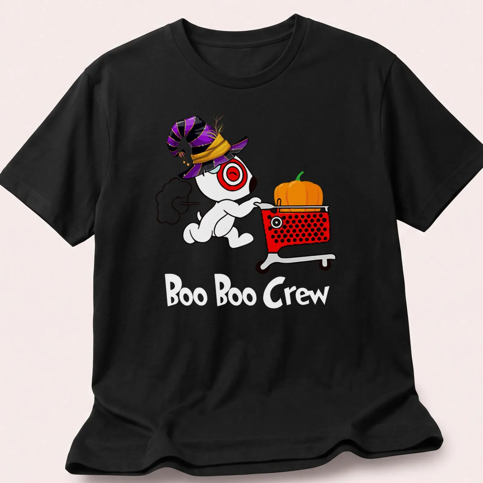 Cartoon dog in witch hat with pumpkin and shopping cart, text: Target Team Member — printed on a unisex t-shirt