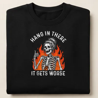 Vintage distressed t-shirt with a thumbs-up skeleton and the text Hang In There It Gets Worse. — printed on a unisex sweatshirt