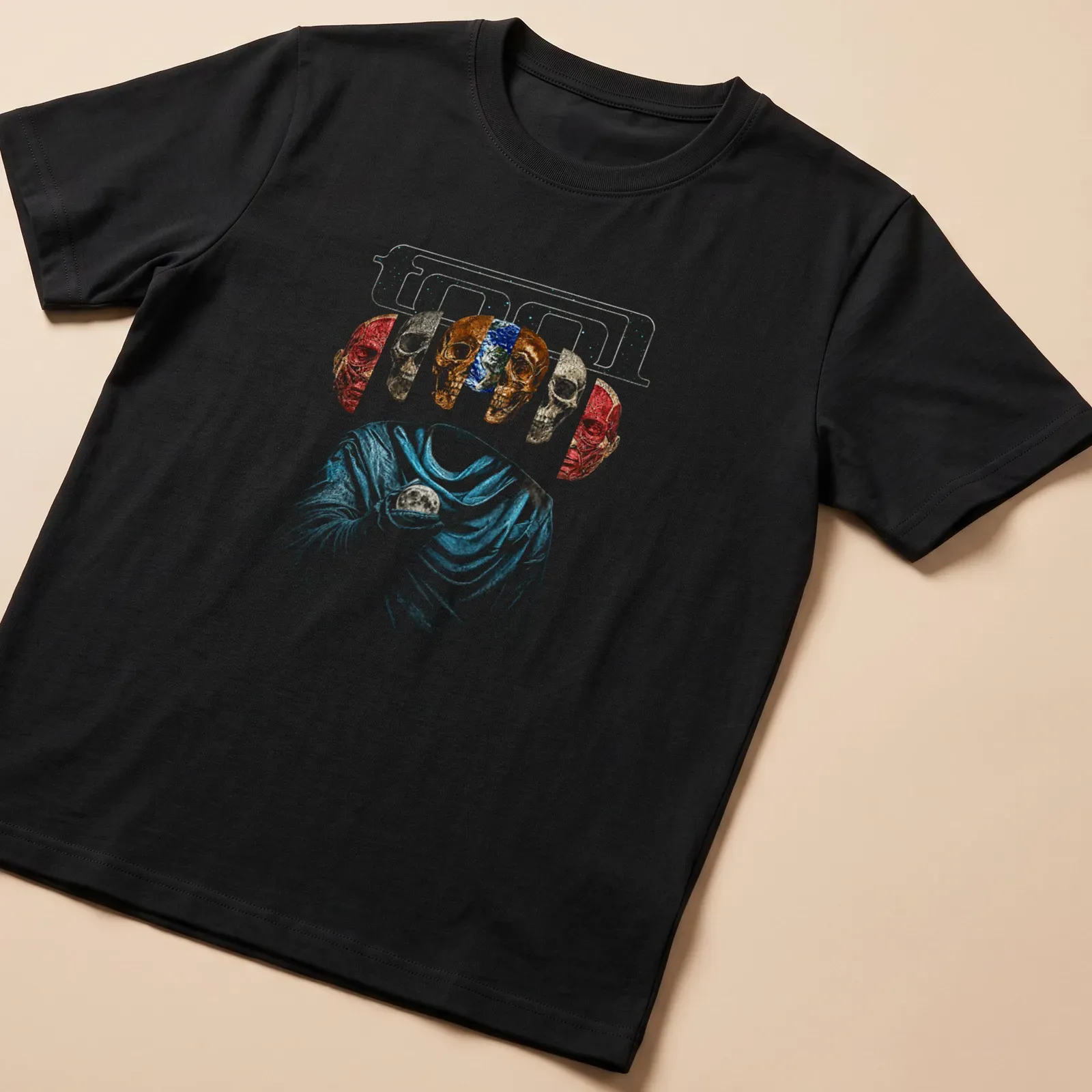 Abstract design of five skulls with glitter effect in multiple colors — printed on a unisex t-shirt