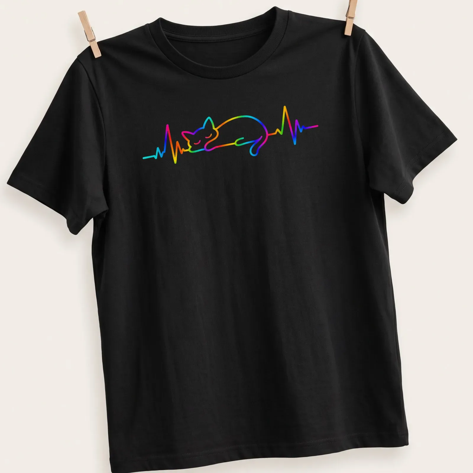 Colorful line art of a sleeping cat with rainbow hues and heartbeat design — printed on a unisex t-shirt