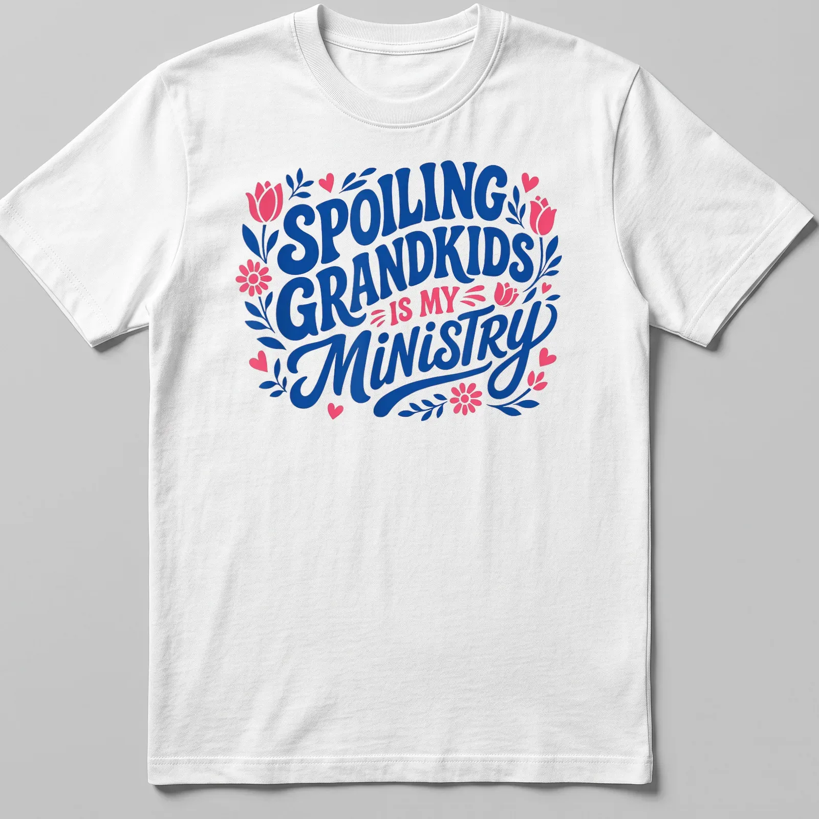 Bold typography t-shirt celebrating grandmothers' love for their grandkids, with floral elements — printed on a unisex t-shirt