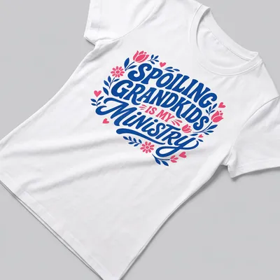 Bold typography t-shirt celebrating grandmothers' love for their grandkids, with floral elements — printed on a women's shirt