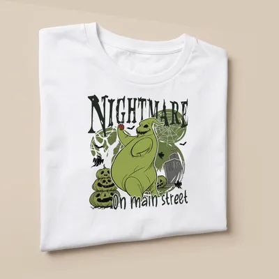 Illustrative horror design of a spooky green ghost with Halloween colors — printed on a unisex t-shirt (angled view)