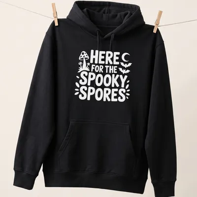 Playful graphic of spooky spores with text saying 'Here For The Spooky Spores' in black, orange, and purple. — printed on a unisex hoodie