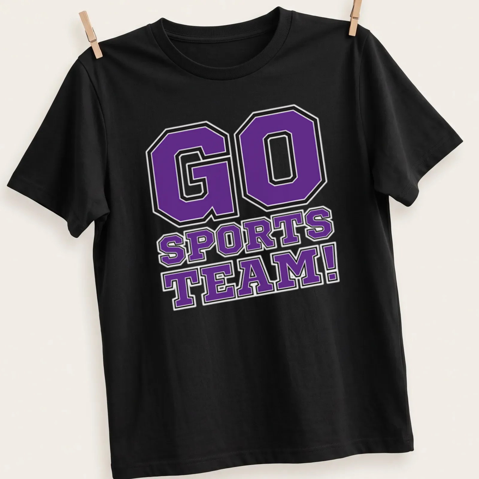 Bold collegiate Go Sports Team t-shirt in purple, black, and white. — printed on a unisex t-shirt