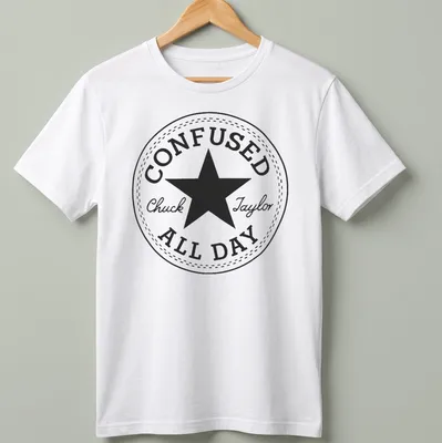 Circular badge with the text Confused Chuck Taylor All Day and a star graphic — printed on a unisex t-shirt