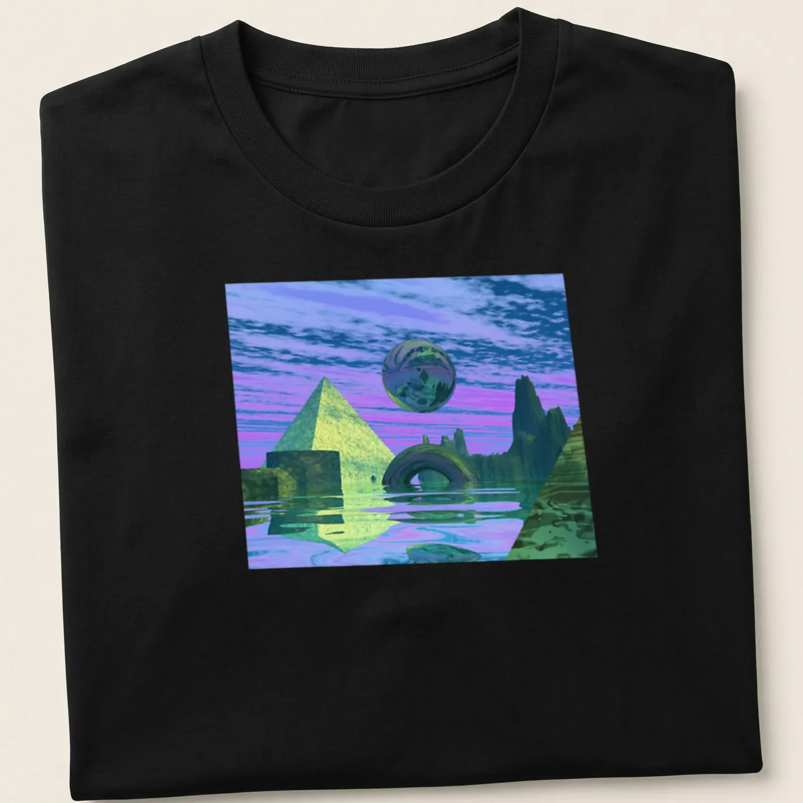 Surreal landscape with pyramids and a sphere in purple, green, blue, and pink — printed on a unisex t-shirt