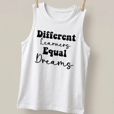 Bold typography Teacher shirt with the phrase Different Learners Equal Dreams printed in black. — printed on a tank top
