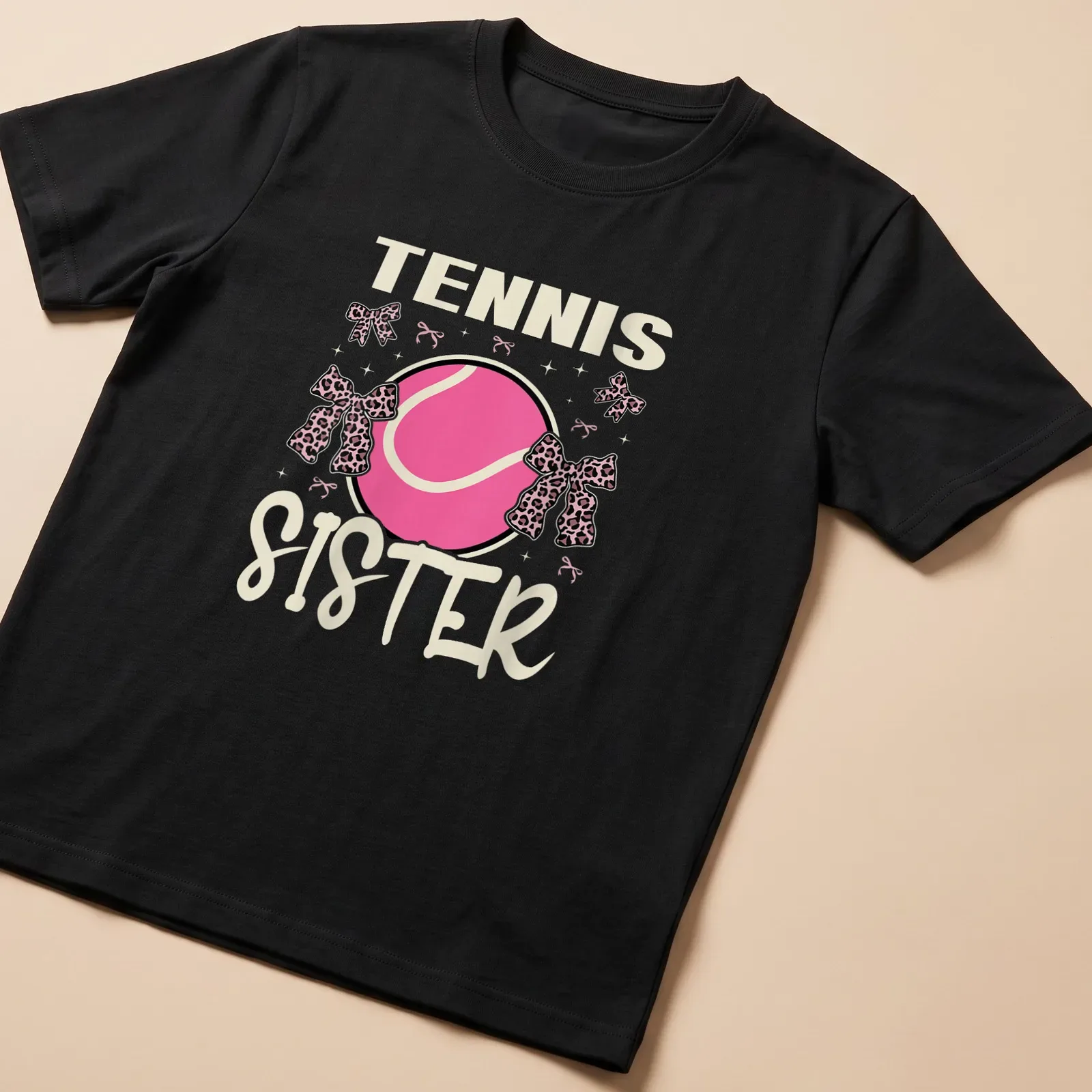 Colorful Tennis Sister t-shirt featuring a tennis ball with a pink bow — printed on a unisex t-shirt