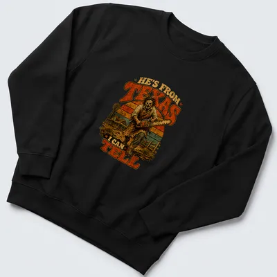 Vintage horror T-shirt featuring a skeleton with a chainsaw and Texas-themed text — printed on a unisex sweatshirt