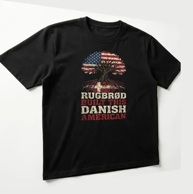 Vintage distressed T-shirt featuring a tree and the text Rugbrød Built This Danish American — printed on a unisex t-shirt (angled view)
