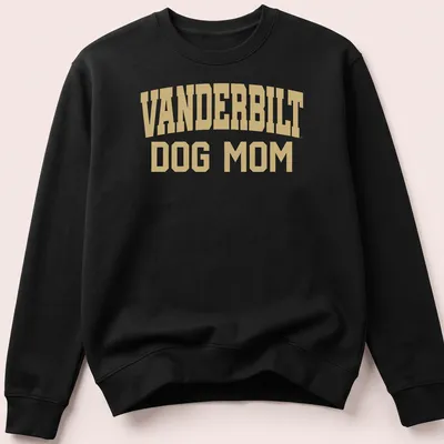 Bold collegiate style Vanderbilt Dog Mom t-shirt in gold and white. — printed on a unisex sweatshirt