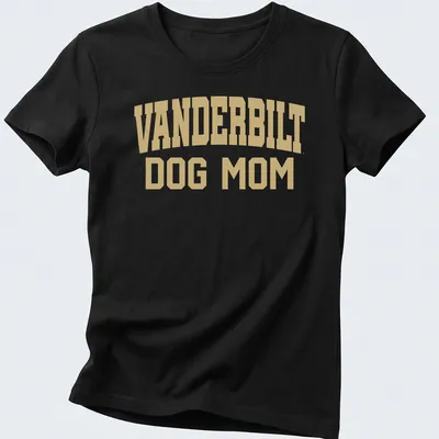 Bold collegiate style Vanderbilt Dog Mom t-shirt in gold and white. — printed on a women's shirt