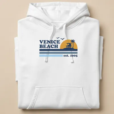 Vintage lifeguard tower graphic t-shirt with Venice Beach est. 1905 text — printed on a unisex hoodie