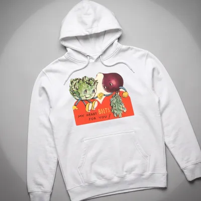 Vintage illustration of smiling beets and broccoli with the text 'My Heart Beets For You!' — printed on a unisex hoodie