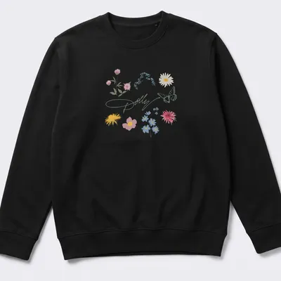 Illustrative T-shirt featuring the text 'Dolly' with wildflowers and a butterfly — printed on a unisex sweatshirt