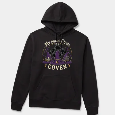Vintage illustration of witch hats and hands with the text 'My Social Circle is a COVEN' in purple and gold. — printed on a unisex hoodie