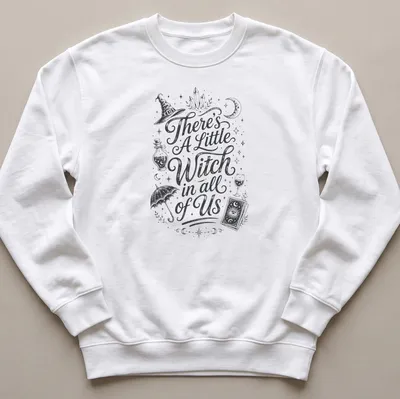 Vintage hand-drawn t-shirt featuring 'There's A Little Witch in all of Us' with witchcraft elements — printed on a unisex sweatshirt