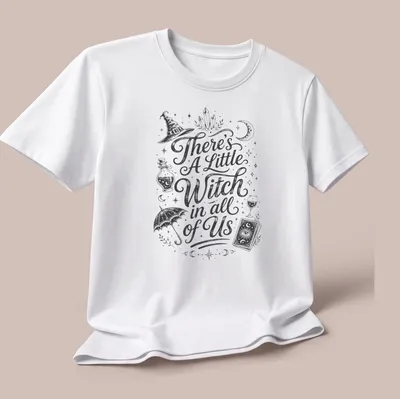 Vintage hand-drawn t-shirt featuring 'There's A Little Witch in all of Us' with witchcraft elements — printed on a unisex t-shirt (angled view)